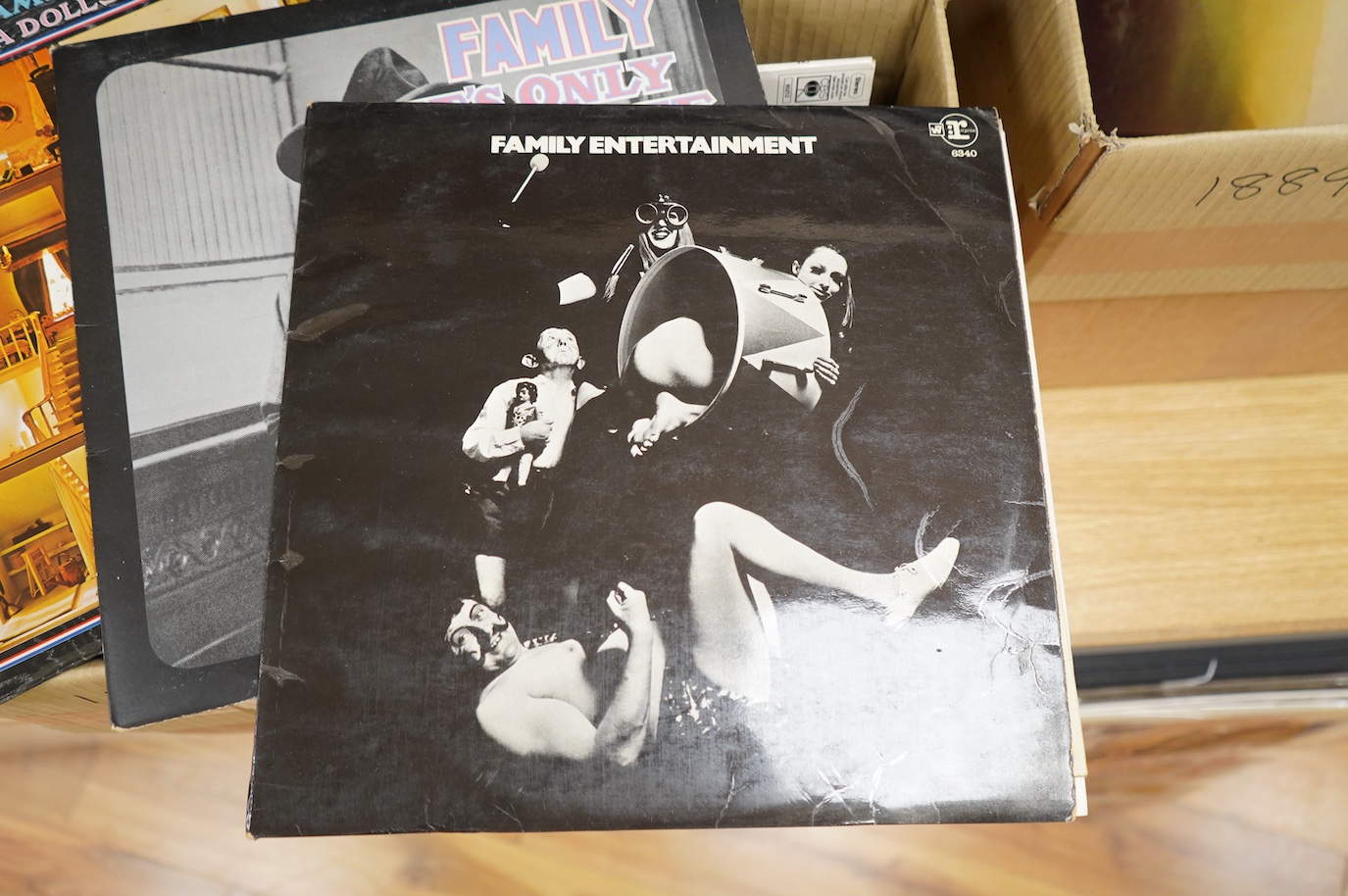 Fifty-four 1970s LP record albums, artists include; Family; Family Entertainment (complete with poster), It’s Only a Movie, Music in Doll’s House, together with Led Zeppelin; Physical Graffiti, David Bowie; the Man Who S